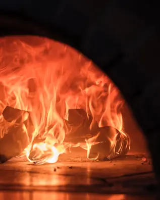 Badrutts Palace Food And Beverage Restaurants Chesa Veglia Pizzeria Heuboden Food Pizza Oven Fire