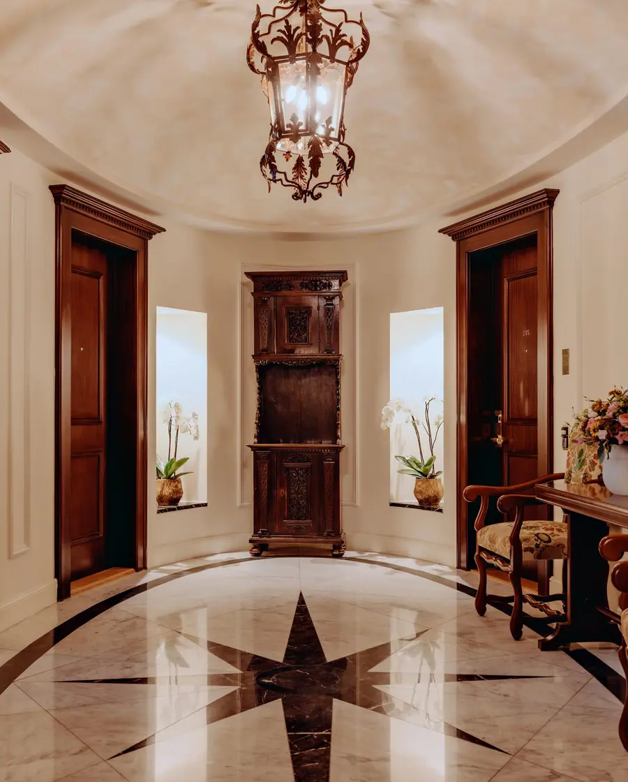 Badrutt's Palace - Grand marble entrance hall with a star-pattern floor